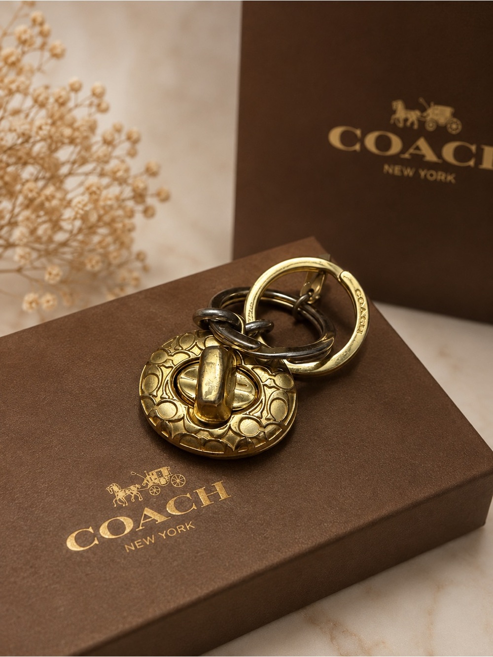 Coach Gold Signature Turnlock Keyring